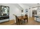 Small dining area with wooden table and chairs near kitchen at 403 Pratt Se Dr # 1009, Atlanta, GA 30315