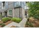 Modern townhouse exterior with brick and walkway at 403 Pratt Se Dr # 1009, Atlanta, GA 30315