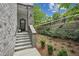 Townhouse entrance with brick steps and landscaping at 403 Pratt Se Dr # 1009, Atlanta, GA 30315