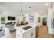 Modern kitchen with island, stainless steel appliances, and white quartz countertops at 403 Pratt Se Dr # 1009, Atlanta, GA 30315