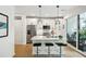 Modern white kitchen with an island and stainless steel appliances at 403 Pratt Se Dr # 1009, Atlanta, GA 30315