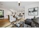 Open living space with comfortable seating and views to kitchen at 403 Pratt Se Dr # 1009, Atlanta, GA 30315