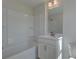 Main bathroom with a bathtub and single vanity at 4826 Floydwood Ln, Mableton, GA 30126