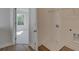 Laundry room with utility sink and shelving at 4826 Floydwood Ln, Mableton, GA 30126