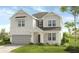 Two-story house with light gray siding, gray roof, and a two-car garage at 524 Nolden Trl, Dacula, GA 30019