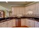 Kitchen with granite countertops and light-colored cabinets at 1540 Winding Creek Cir, Snellville, GA 30078