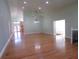 Bright dining room with hardwood floors and high ceilings at 1616 Oleander Sw Dr, Lilburn, GA 30047