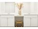 Elegant double vanity bathroom with a modern design and a stylish vase at 2803 Habibi Ct, Buford, GA 30519