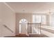 Home entryway with arched door, showing staircase and views to living room at 2895 Ivy Mill Dr, Buford, GA 30519