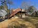 House with spacious deck and stairs leading to backyard at 1294 N Avenue Nw, Atlanta, GA 30318