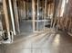 Unfinished basement with exposed framing and tile floor at 1294 N Avenue Nw, Atlanta, GA 30318