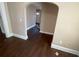 Spacious living room with hardwood floors and arched entryway at 1294 N Avenue Nw, Atlanta, GA 30318