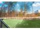 Large backyard with fenced perimeter and lush green grass at 2336 Morgan Estate Dr, Buford, GA 30519