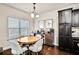 Bright breakfast nook features a round table and chairs, perfect for morning coffee at 2336 Morgan Estate Dr, Buford, GA 30519