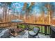 Cozy deck overlooks a wooded backyard, perfect for outdoor relaxation at 2336 Morgan Estate Dr, Buford, GA 30519