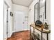 Inviting entryway with wood-look floors and decorative console table at 2336 Morgan Estate Dr, Buford, GA 30519