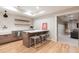 Basement bar with white quartz countertops and wooden shelves at 4373 Wieuca Ne Rd, Atlanta, GA 30342