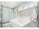 Spa-like bathroom with a large soaking tub and walk-in shower at 4373 Wieuca Ne Rd, Atlanta, GA 30342