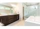 Elegant bathroom with double vanity, soaking tub, and shower at 4373 Wieuca Ne Rd, Atlanta, GA 30342