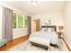 Peaceful bedroom with hardwood floors and large windows at 4373 Wieuca Ne Rd, Atlanta, GA 30342