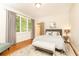 Bright bedroom with hardwood floors and large windows at 4373 Wieuca Ne Rd, Atlanta, GA 30342