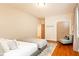 Spacious bedroom with hardwood floors and sitting area at 4373 Wieuca Ne Rd, Atlanta, GA 30342