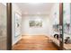 Spacious entryway with hardwood floors and artwork at 4373 Wieuca Ne Rd, Atlanta, GA 30342