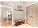 Bright entryway with hardwood floors, coat rack, and bench at 4373 Wieuca Ne Rd, Atlanta, GA 30342