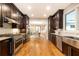 Modern kitchen with stainless steel appliances and hardwood floors at 4373 Wieuca Ne Rd, Atlanta, GA 30342