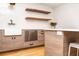 Stylish kitchen featuring a farmhouse sink and wood cabinetry at 4373 Wieuca Ne Rd, Atlanta, GA 30342