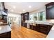 Modern kitchen with stainless steel appliances and hardwood floors at 4373 Wieuca Ne Rd, Atlanta, GA 30342