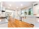 Modern kitchen with stainless steel appliances and hardwood floors at 4373 Wieuca Ne Rd, Atlanta, GA 30342