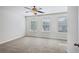 Spacious bedroom with ceiling fan and plush carpeting at 585 Mcwilliams Se Rd # 807, Atlanta, GA 30315