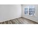 Bright bedroom featuring hardwood floors and large windows at 585 Mcwilliams Se Rd # 807, Atlanta, GA 30315