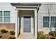 Gray front door with sidelights and a covered entryway at 585 Mcwilliams Se Rd # 807, Atlanta, GA 30315