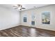 Bright living room with wood-look floors and access to backyard at 585 Mcwilliams Se Rd # 807, Atlanta, GA 30315