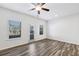 Bright living room with wood-look floors and access to backyard at 585 Mcwilliams Se Rd # 807, Atlanta, GA 30315