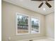 Bright bedroom with ceiling fan and two large windows at 1330 Sw Adams Dr, Atlanta, GA 30311