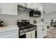 Stainless steel gas range and microwave in a modern kitchen setting at 1330 Sw Adams Dr, Atlanta, GA 30311