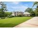 Grand two-story home with manicured lawn at 205 Slaton Cir, Roswell, GA 30075