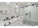 Modern bathroom with marble finishes, double vanity, and a large walk-in shower at 4107 Old Suwanee Rd, Buford, GA 30518