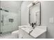 Spa-like bathroom with a large shower, modern vanity, and marble details at 4107 Old Suwanee Rd, Buford, GA 30518