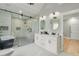 Spa-like bathroom with marble finishes, a freestanding tub, and walk-in shower at 4107 Old Suwanee Rd, Buford, GA 30518