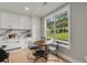 Kitchen breakfast nook with a round table and chairs at 4107 Old Suwanee Rd, Buford, GA 30518