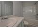 Bathroom with tub, toilet and vanity at 477 Charleston Pl, Villa Rica, GA 30180