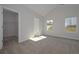 Main bedroom with carpet, neutral walls, and a walk-in closet at 477 Charleston Pl, Villa Rica, GA 30180