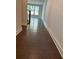 Hallway with hardwood floors and staircase at 1250 Winterhaven Dr, Cumming, GA 30041