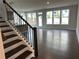 This living room features hardwood floors and plenty of natural light at 1250 Winterhaven Dr, Cumming, GA 30041