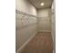 Walk-in closet includes wire shelving and carpeted flooring at 1250 Winterhaven Dr, Cumming, GA 30041