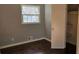 Simple bedroom with hardwood floors and closet at 2030 Sanders Dr, Austell, GA 30168